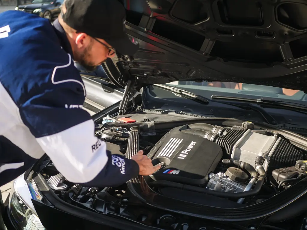 Inspection of a BMW M engine bay